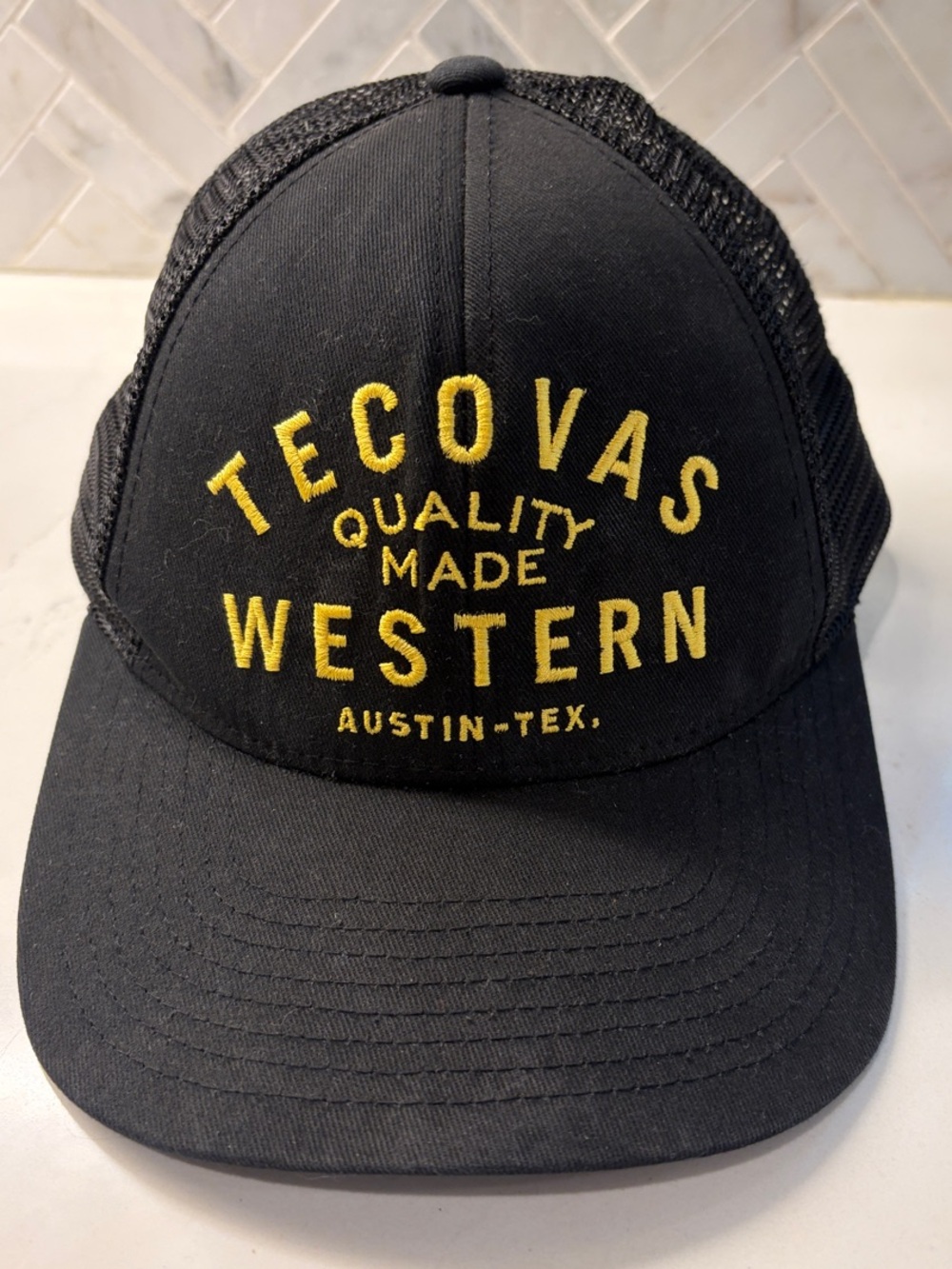 Tecovas Black Trucker Cap with Yellow Gold Embroidery Austin Texas